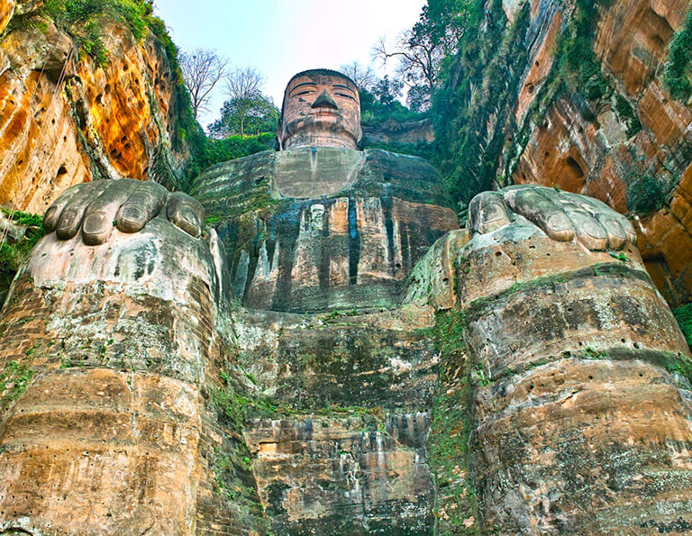 Look up at Leshan Giant Buddha from its foot stage