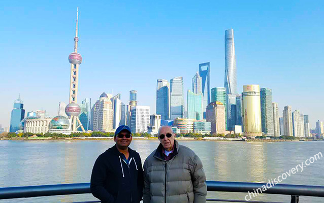 Tourists Took Photo at The Bund with Backdrop of Lujiazui