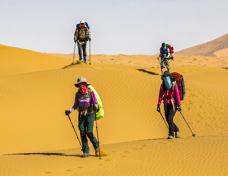 Brave hikers in Badain Jaran Desert