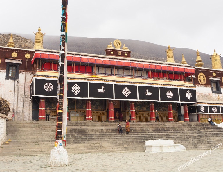 Monks at Drepung Monastery Entrance