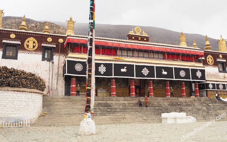 Monks at Drepung Monastery Entrance