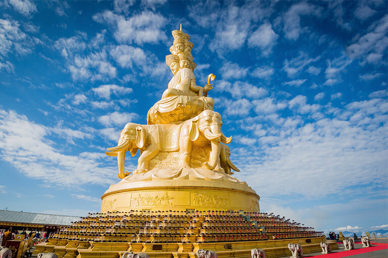 The multi-faced golden statue (48m) of Samantabhadra Bodhisattva at Golden Summit