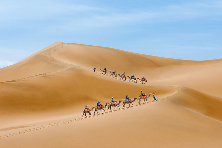 Riding Camel at Mingshashan (Echoing Sand Mountains)