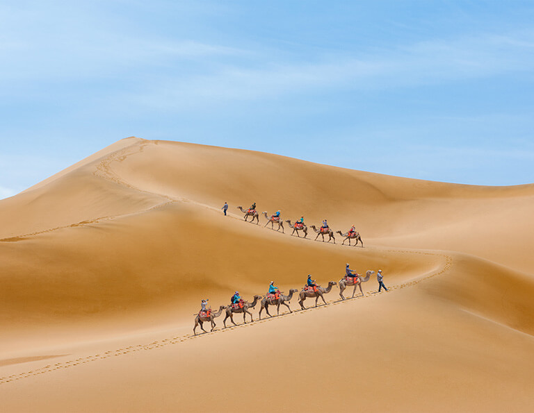 Riding Camel at Mingshashan (Echoing Sand Mountains)