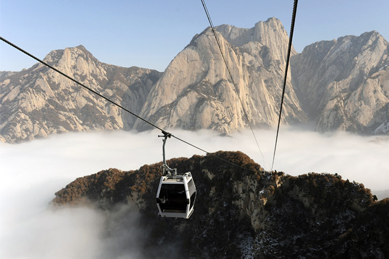 West Peak Cableway Hanging over 900 meters above the valley