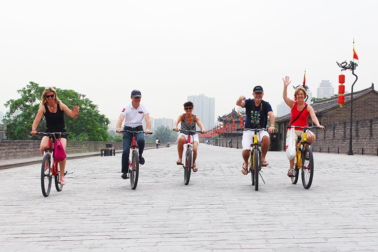 Our guests biking on the Ancient City Wall